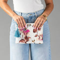White & Multicolored Floral Pouch